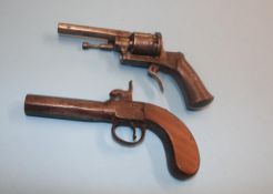 A percussion pistol and one other