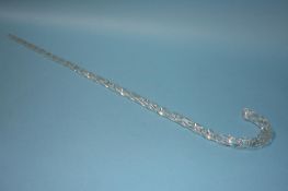 A glass twist stem walking cane