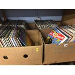 Four boxes of vinyl albums