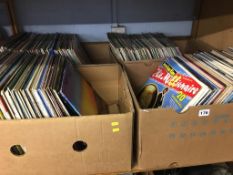 Four boxes of vinyl albums