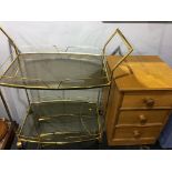 An oak bedside chest and a tea trolley