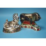 A Royal Crown Derby paperweight of a 'Bull' and a 'Zebra', with gold stoppers (2)