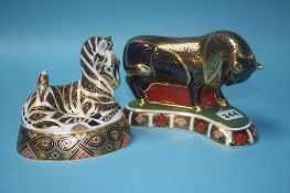 A Royal Crown Derby paperweight of a 'Bull' and a 'Zebra', with gold stoppers (2)