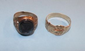 A 9ct gold belt ring, weight 3 grams and a 9ct gold Signet ring, total weight 5.1 grams