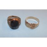 A 9ct gold belt ring, weight 3 grams and a 9ct gold Signet ring, total weight 5.1 grams