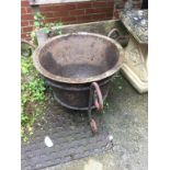Cast iron bowl on stand and a large vice