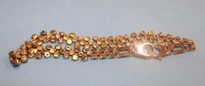 An 18ct gold bracelet set with diamonds, weight 21.2 grams ( stamped 750)