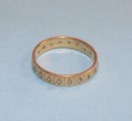 An 18ct gold diamond eternity ring, weight 3.1 grams