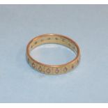 An 18ct gold diamond eternity ring, weight 3.1 grams