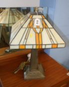 A table lamp, with Tiffany glass style shade