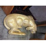 Large gold coloured plaster and glass model of a dog