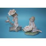 Two Lladro figures 'Somewhere in the Garden' and 'Lily Pad Love', with boxes