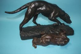 Two sculptures of dogs