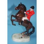 A Beswick huntsman on a rearing horse, number 868