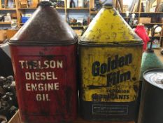 Two vintage oil cans