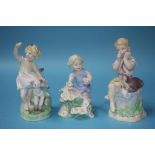 Three Royal Worcester figures; April, May and June, modelled by Freda G. Doughty