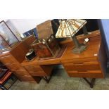 An EoN teak chest of drawers and dressing table