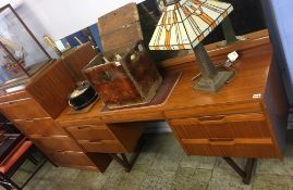 An EoN teak chest of drawers and dressing table
