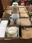 Box of as new mugs and a box of as new storage jars