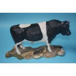 A Royal Doulton model of a cow