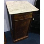 A Victorian mahogany and marble top bedside cabinet