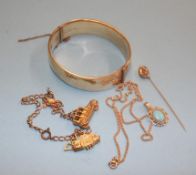 A 9ct necklace, a bangle stamped '9ct RG', a pin etc.