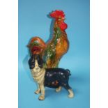 Cast model of a dog and a large pottery cockerel