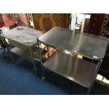 Two metal work tables