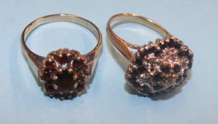 A 9ct gold sapphire and diamond ring and a 9ct gold and garnet set ring, total weight 9.1 grams