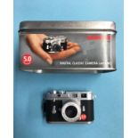 Mini Leica digital camera and box