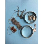 Selection of silver bangles etc.