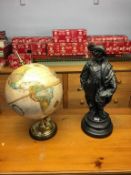 A Spelter figure and a globe