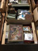 Two boxes of post cards and stamps etc.