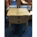 A two drawer bedside table