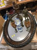 Mirror, three spelter figures and a Ringtons jug
