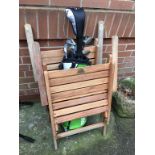 Pair of teak garden chairs and various golf clubs