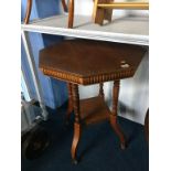 An Edwardian mahogany occasional table