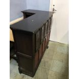 An oak bar and two stools