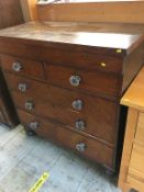 A 19th century mahogany chest of drawers with glass handles
