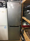 A Samsung silver fridge freezer