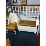 A white Lloyd Loom chair and an ottoman