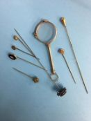 Lorgnette and a collection of pins