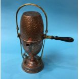 A Continental hammered copper spirit kettle and stand
