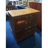 A teak chest of drawers