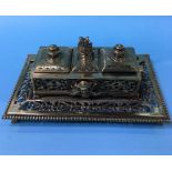 A pierced brass inkstand