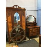 An Edwardian walnut wardrobe, dressing table and bed ends