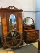 An Edwardian walnut wardrobe, dressing table and bed ends