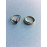 An 18ct ring, 3.6g and a 9ct ring, 1.6g