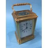 A brass cased four glass carriage clock, striking movement, dial signed Jump and Sons