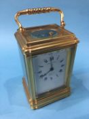 A brass cased four glass carriage clock, striking movement, dial signed Jump and Sons